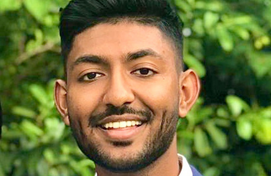 Head shot of male dental professional in suit jacket and tie